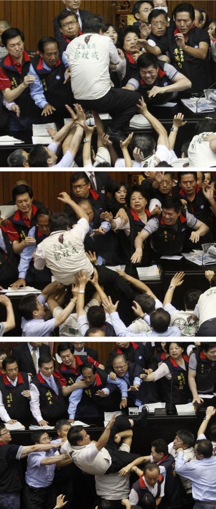 A combination photograph shows opposition DPP legislator Kuo falling off the podium in Taipei