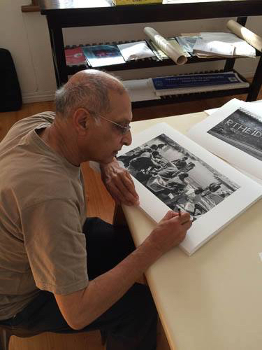 Omar Badsha working on exhibition